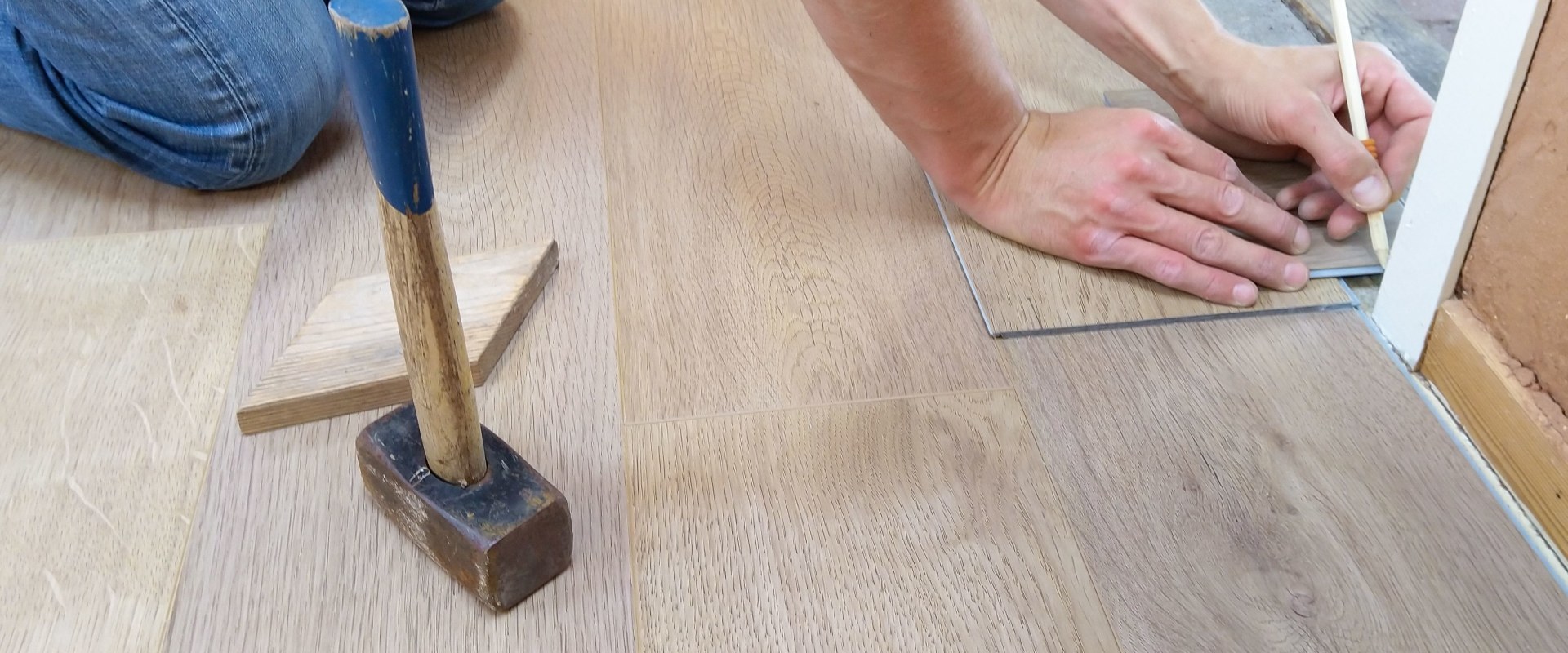 Pair Deck Construction With Laminate Flooring for a Cohesive St. George, UT Home