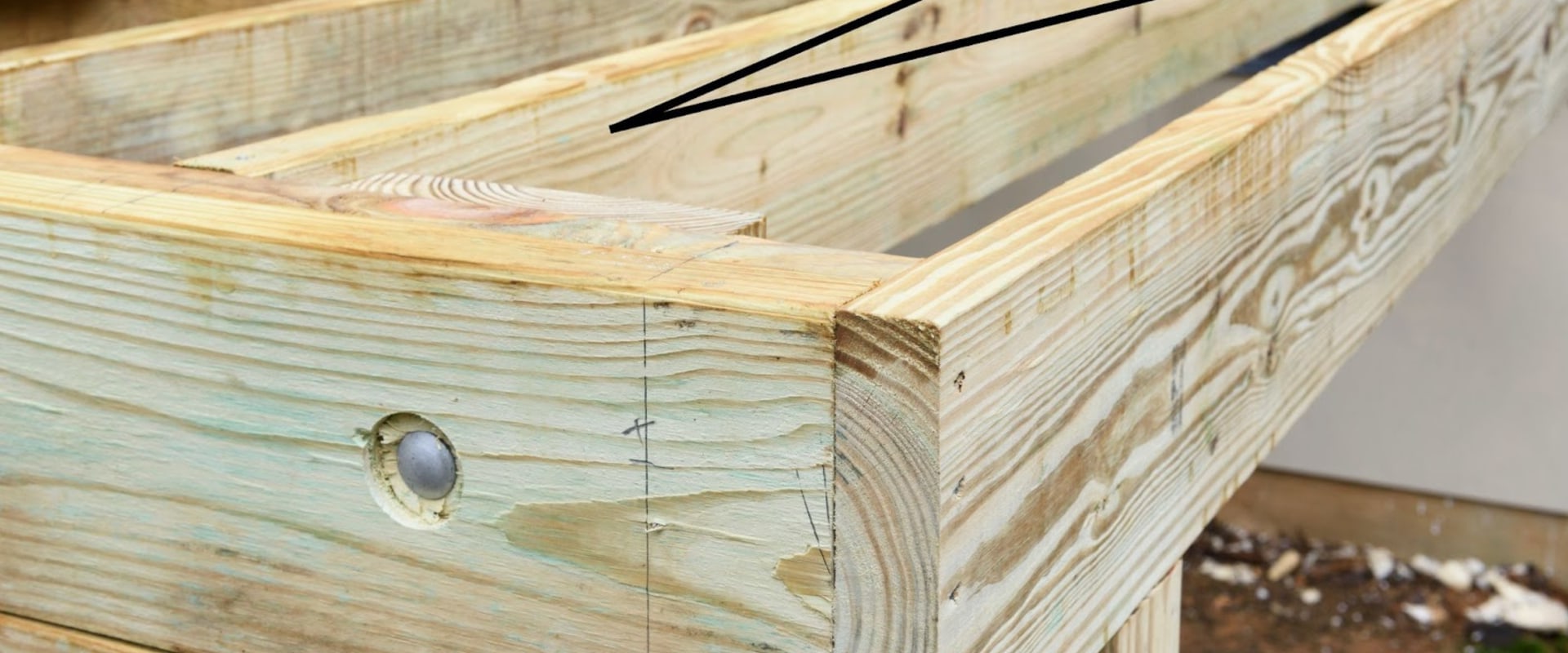 How Much Space Should be Left Between Ledgers During Deck Construction?