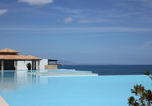 Enhance Your Eco-Friendly Swimming Pond with Stunning Deck Construction